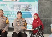 Kapolres Sumenep Serahkan Buku Edukasi dan Sarkon di SMP Binar Junior High School