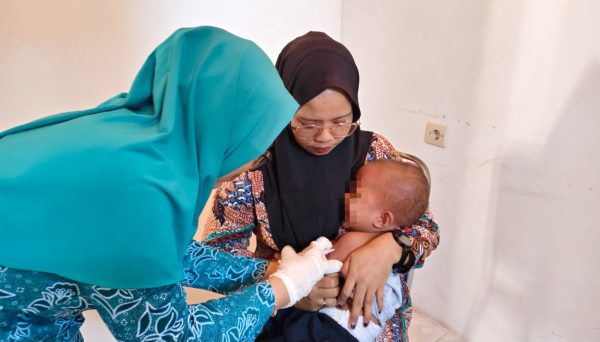 Pemdes Saobi Bersama Nakes dan Kader Posyandu Komitmen Cegah Penyakit Campak Lewat Vaksinasi